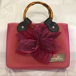 Small handbag with changeable decoration